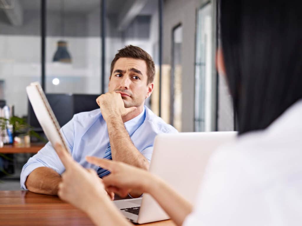 Skeptical landlord interviews a prospective tenant in Phoenix.